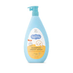Bottle of baby shampoo and body wash with a blue pump on a white background