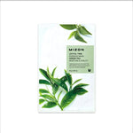 Mizon Joyful Time Essence Mask packaging with green tea leaves on a white background